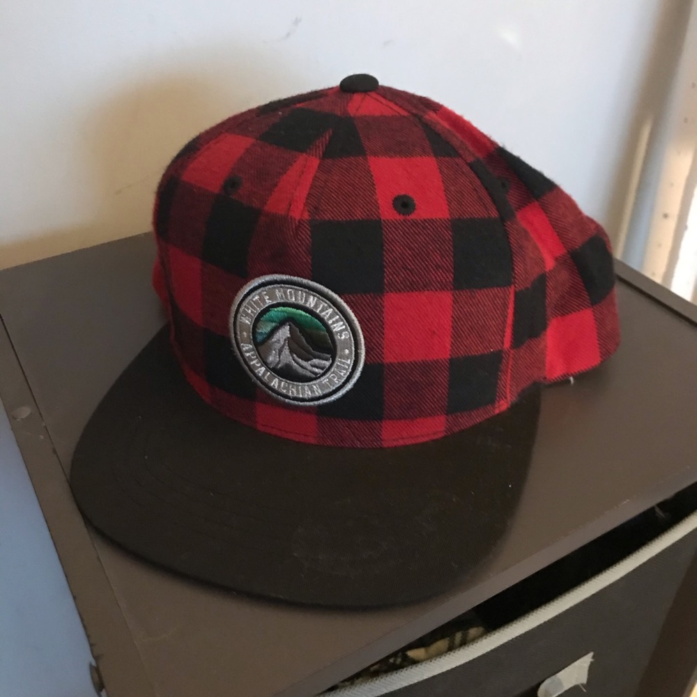 red & black plaid snapback with patch